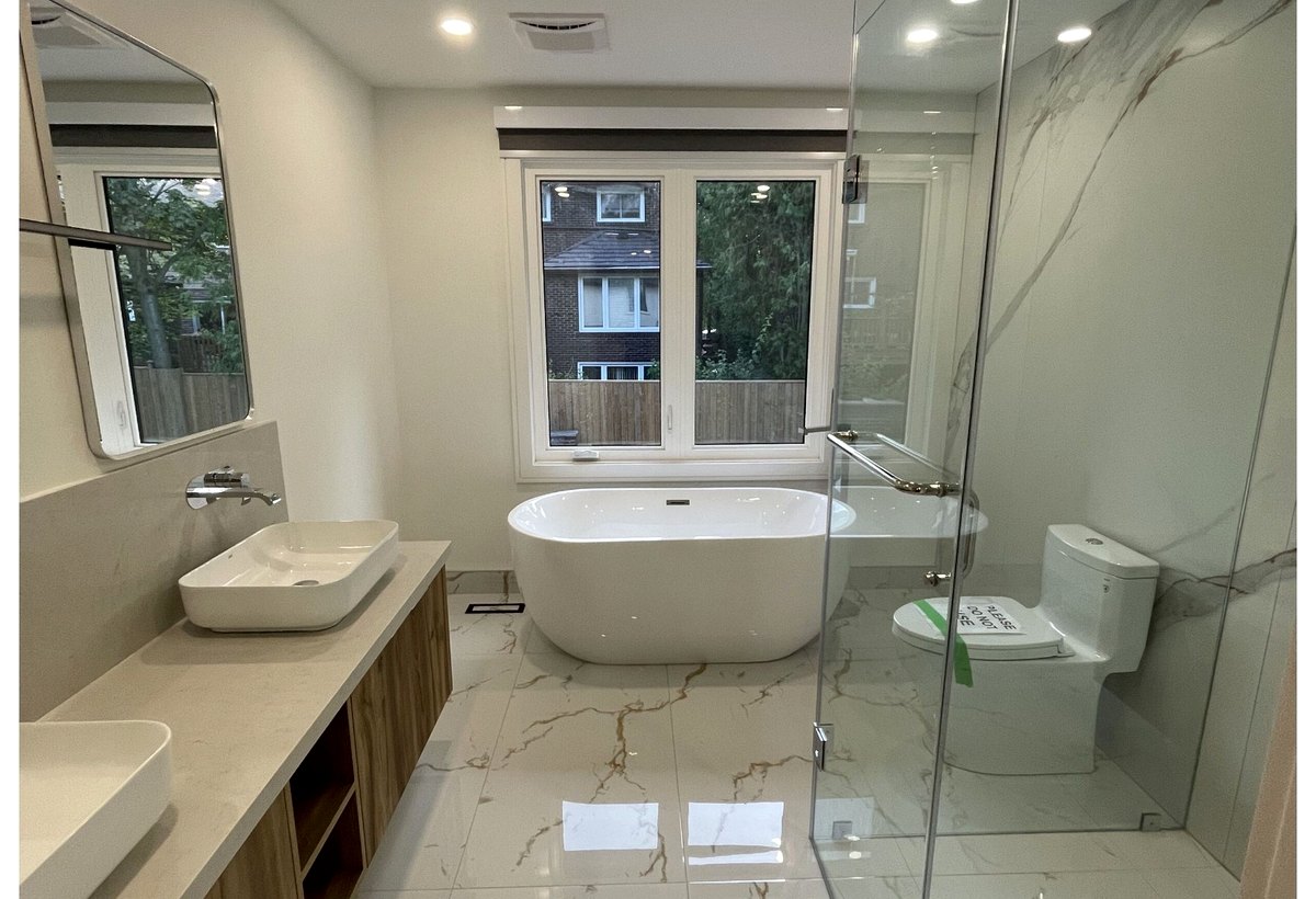 North York bathroom renovation - tub and glass shower