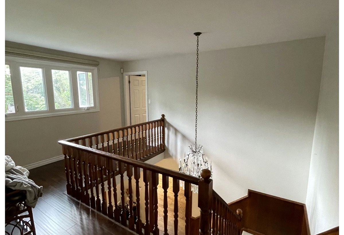 North York upper hall and railing - before