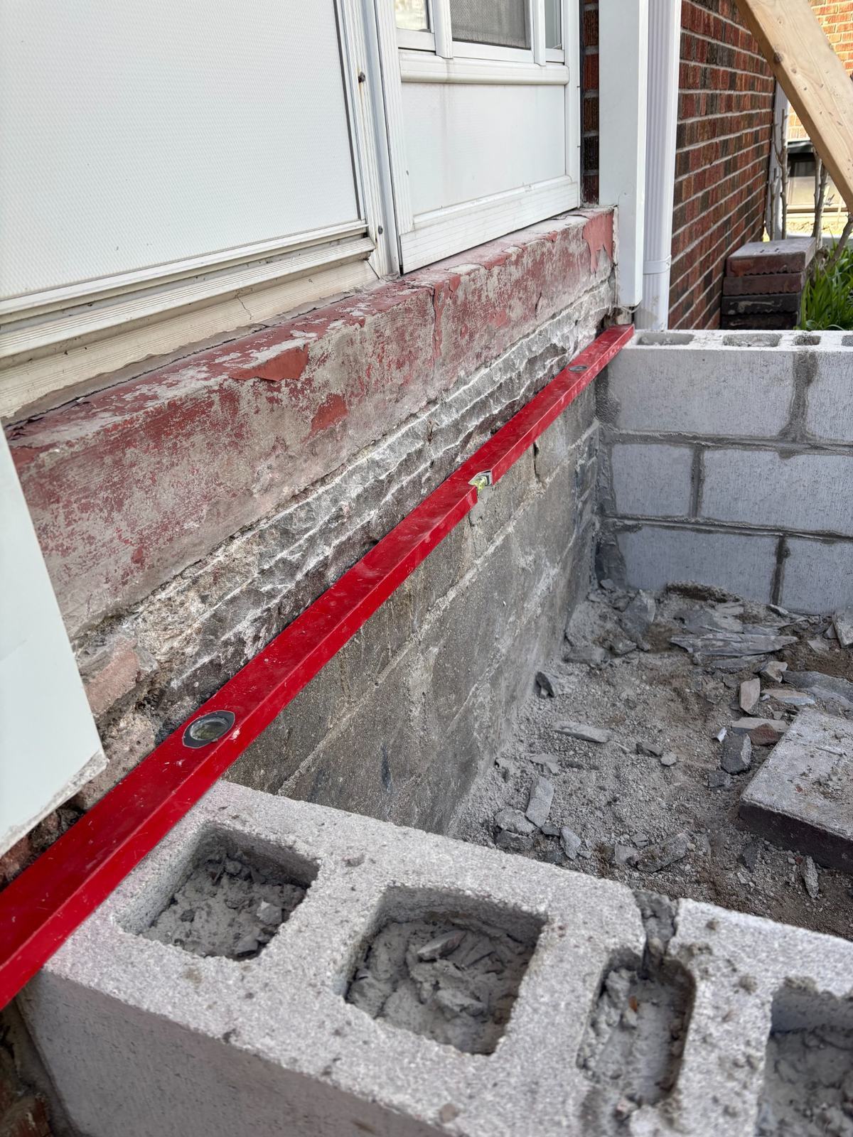 Scarborough concrete project - Level check against existing foundation wall