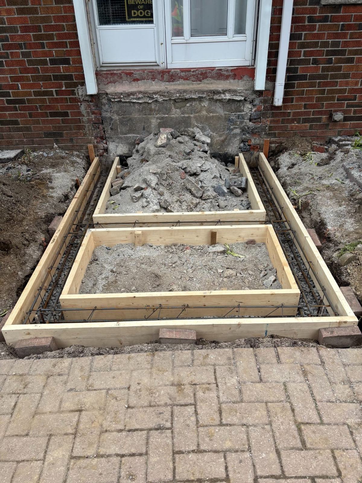 Original front entry framing and removal stage
